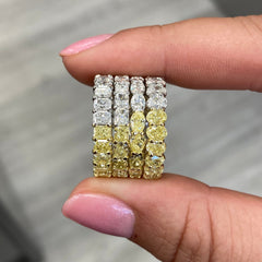 Wear two ways diamond eternity band. Undecided eternity ring. Diamond eternity ring. Fancy yellow and white alternating eternity band. Alternating diamond ring.