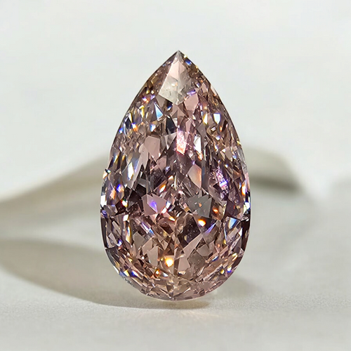 Fancy pink pear shaped diamond with subtle color, GIA certified.