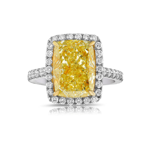 GIA certified natural canary yellow diamond ring surrounded by a halo of white diamonds.