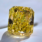 Elongated natural canary yellow diamond, GIA certified, with sparkling facets.
