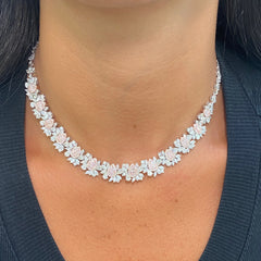 GIA certified light pink pear shape diamonds with mixed white diamonds in a stunning necklace.