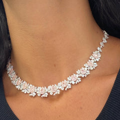 GIA certified light pink pear shape diamonds with mixed white diamonds in a stunning necklace.