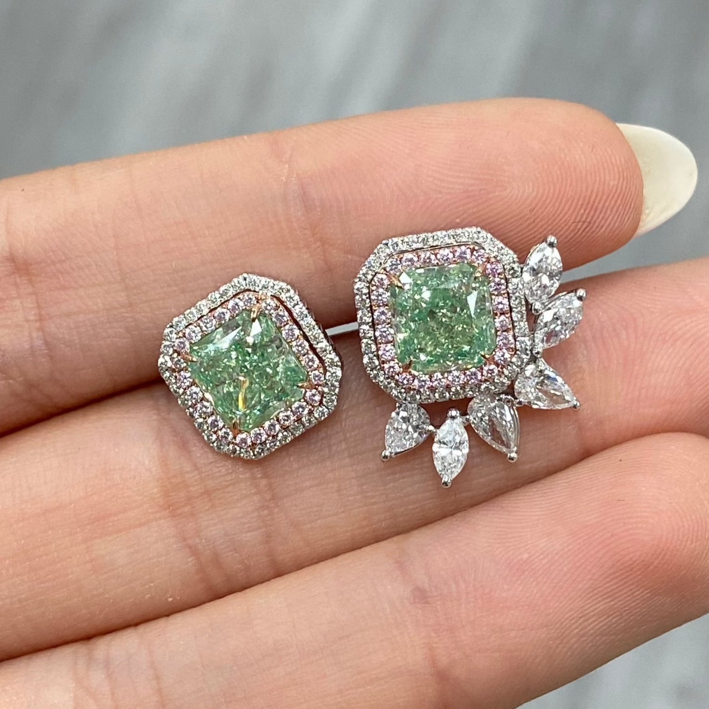 natural green diamond earrings, green diamond stud earrings with white and pink diamonds surrounding