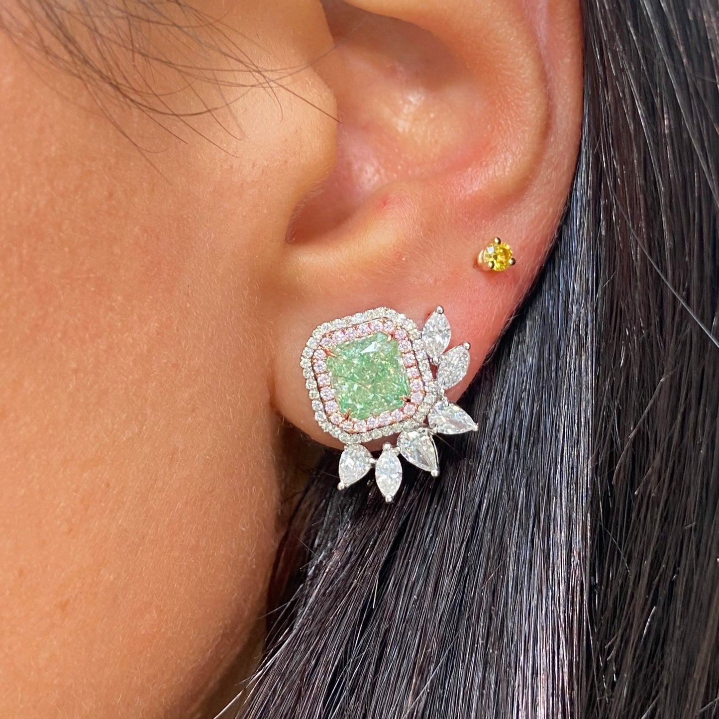 natural green diamond earrings, green diamond stud earrings with white and pink diamonds surrounding