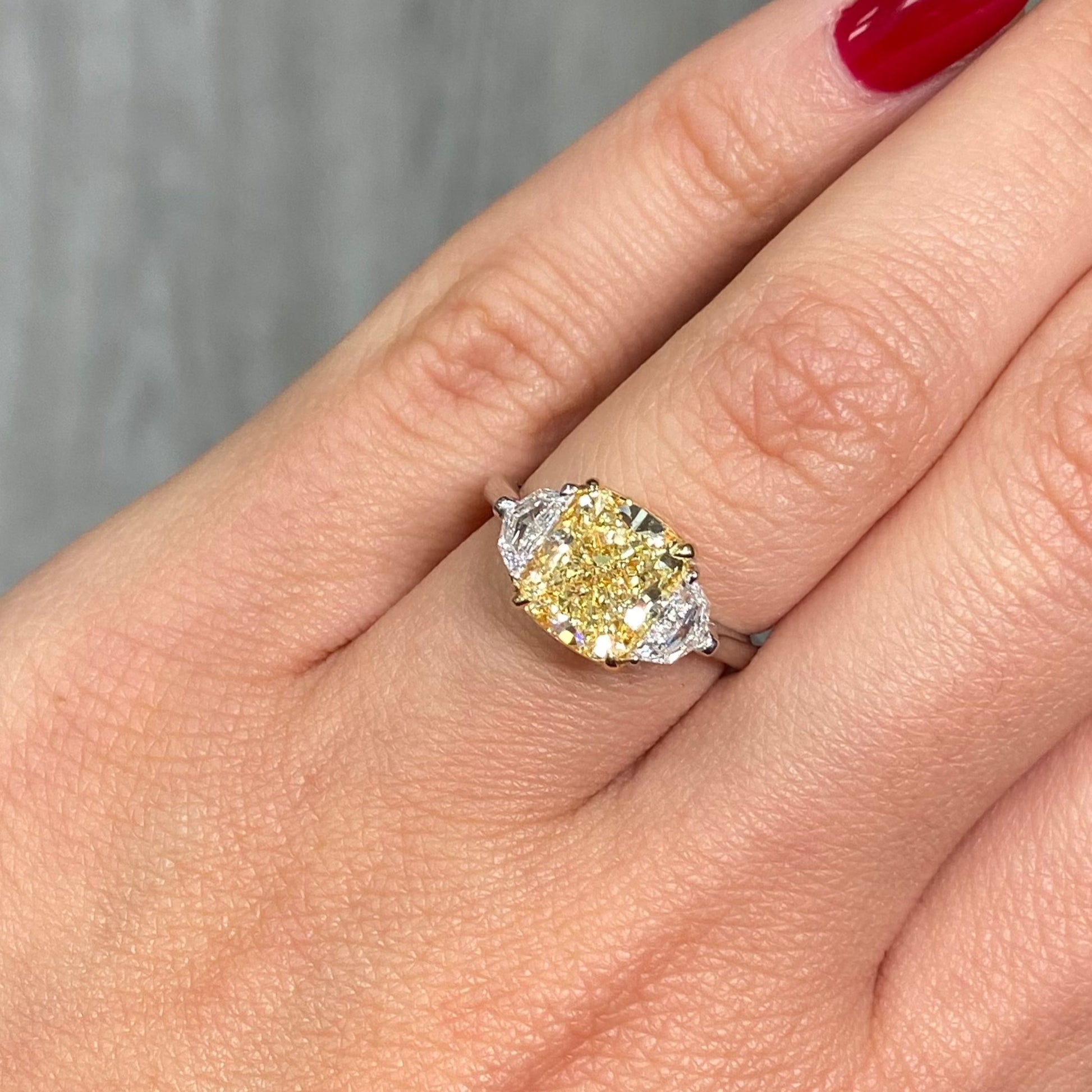 3 Carat Fancy Yellow VVS1 Cushion Diamond 3 Stone Ring, unique engagement ring style