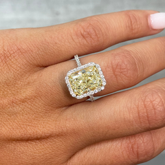 5 Carat Light Yellow elongated radiant cut  in halo diamond ring