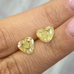 Unique matched pair yellow heart shaped diamonds, GIA certified.