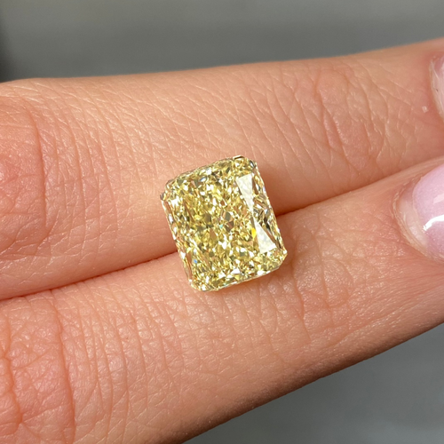 Fancy Elongated 5 carat yellow diamond.