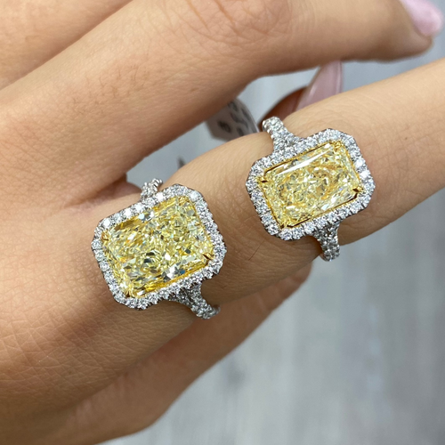 Elongated yellow diamond ring with white diamonds 