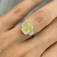 3 carat elongated radiant fancy yellow diamond ring
