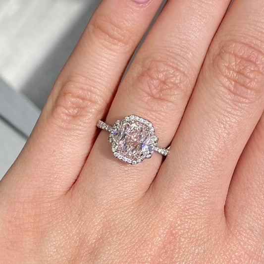 natural pink diamond ring, fancy light orangy pink diamond, halo diamond ring with pink diamond