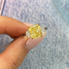 3.29ct Fancy Yellow Elongated Radiant Diamond Three Stone Ring