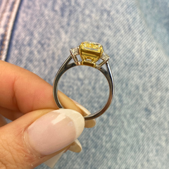 3.29ct Fancy Yellow Elongated Radiant Diamond Three Stone Ring