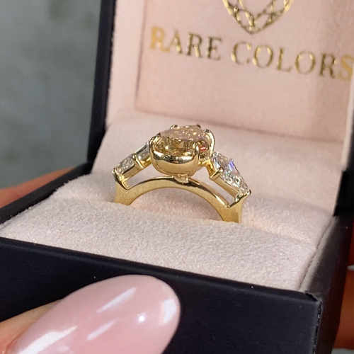 4 Carat Step Cut Pear Shape Champagne Diamond Three Stone Ring