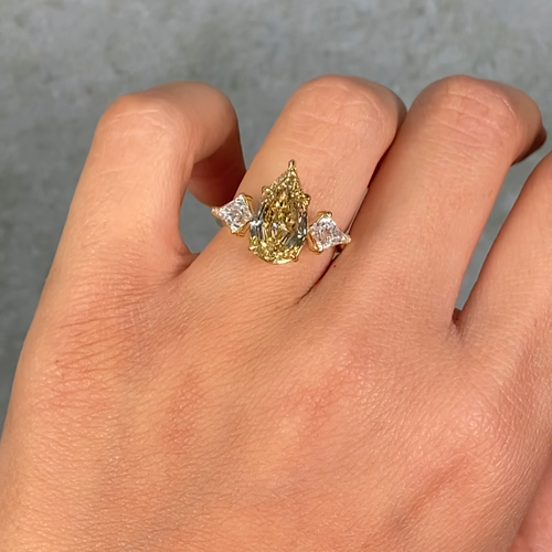 4 Carat Step Cut Pear Shape Champagne Diamond Three Stone Ring