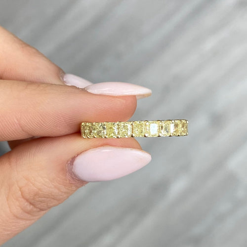 Fancy yellow eternity ring. Yellow diamond eternity band. Yellow diamond wedding band. Yellow diamond ring. Yellow diamond jewelry