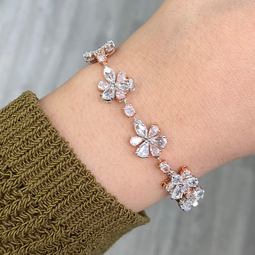 rare colors. pink diamond bracelet. pink floral bracelet. pink pear shape diamond. pink and white diamond bracelet. Natural pink diamond jewelry.