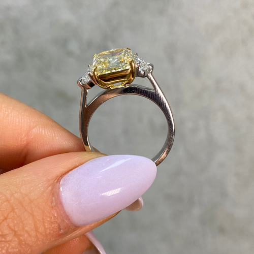 5.13 Carat Fancy Yellow Elongated Radiant Cut Diamond Three Stone Engagement Ring