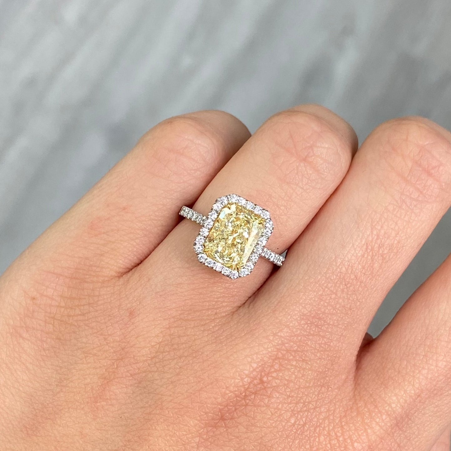 3.31 Carat  Light Yellow (W-X) VS2 Clarity  Radiant Cut Diamond  0.44 Carats of White Rounds  GIA Certified Diamond  Crafted in Platinum and 18k Yellow Gold  Handmade in NYC