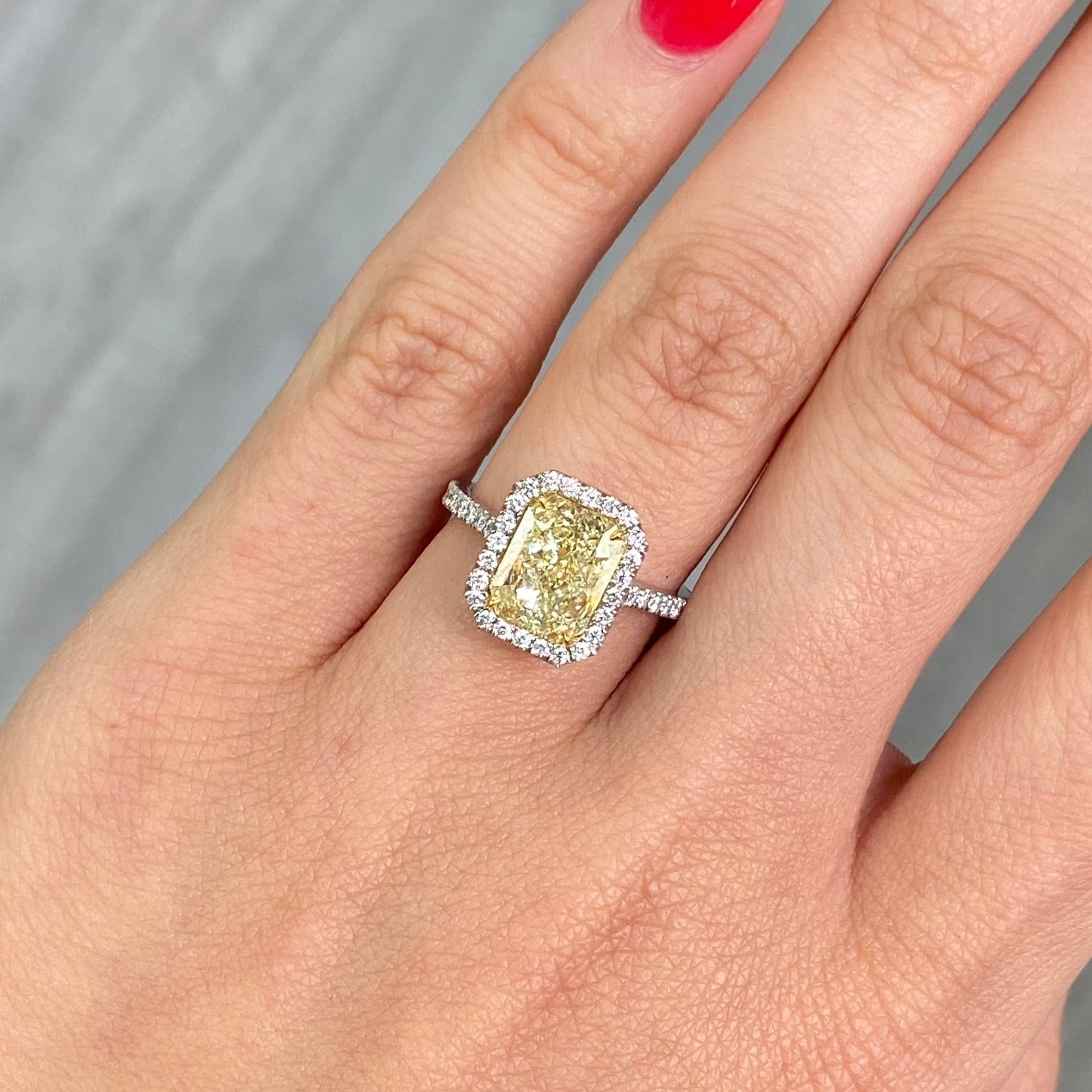 3.31 Carat  Light Yellow (W-X) VS2 Clarity  Radiant Cut Diamond  0.44 Carats of White Rounds  GIA Certified Diamond  Crafted in Platinum and 18k Yellow Gold  Handmade in NYC