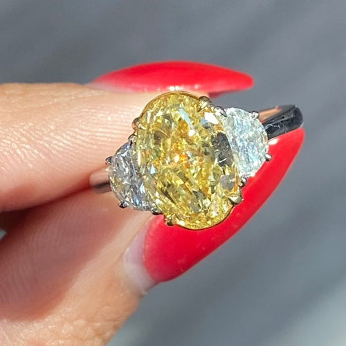 3ct Fancy intense Yellow Oval Three Stone Diamond Ring, a canary oval diamond!