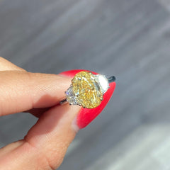 3ct Fancy intense Yellow Oval Three Stone Diamond Ring, a canary oval diamond!