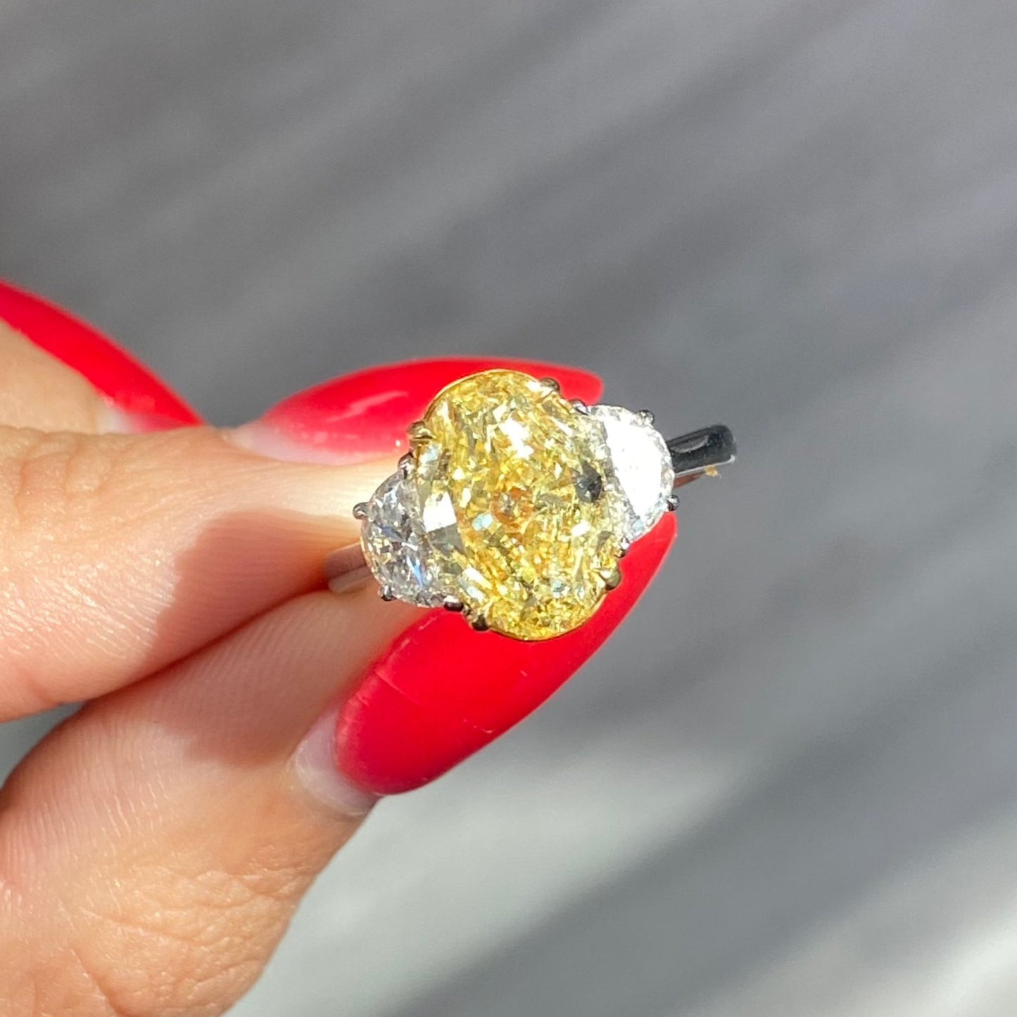 3ct Fancy intense Yellow Oval Three Stone Diamond Ring, a canary oval diamond!