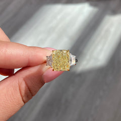 7 carat yellow diamond ring, unique canary diamond engagement ring, elongated radiant diamond, light yellow elongated diamond.