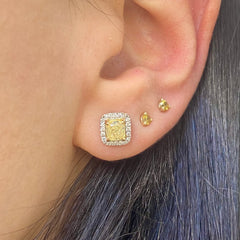 Fancy Light Yellow Cushion Diamond Studs 1.42 carat total center diamonds  Center diamonds are 0.71ct each  Surrounded by 0.22 Carats of White Radiant Diamonds Set in 18k Gold Handmade in NYC 