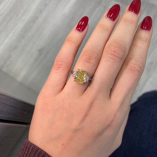 Yellow diamond engagement ring 
elongated cushion cut yellow diamond