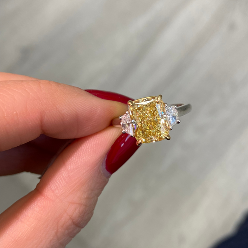 Yellow diamond engagement ring 
elongated cushion cut yellow diamond