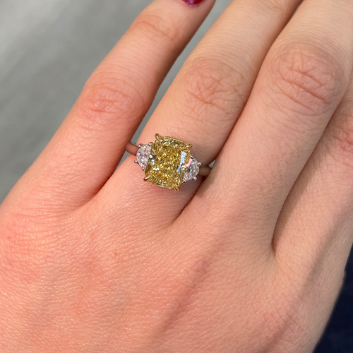 Yellow diamond engagement ring 
elongated cushion cut yellow diamond