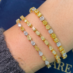 Luxurious bracelet pear-shaped fancy yellow and white diamonds in an elegant design.