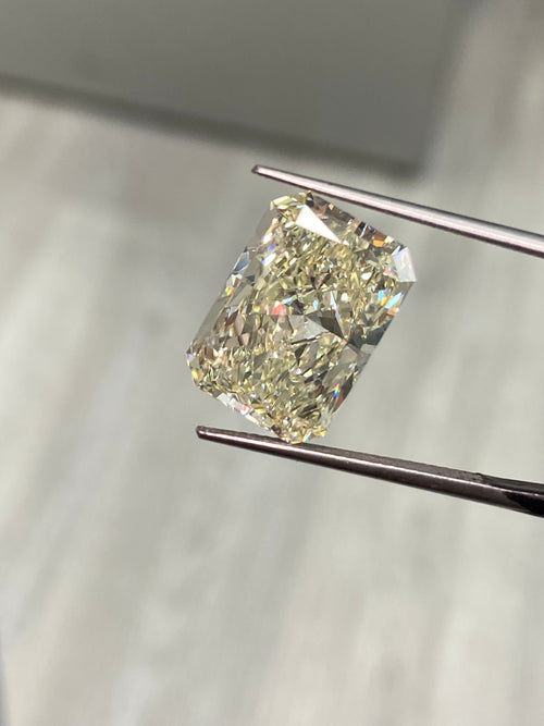 Unique Intense Yellow Elongated Diamond, GIA Certified with VS2 clarity.