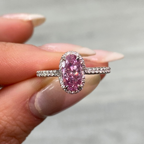 GIA certified vivid purple-pink oval diamond ring, a unique marvel of nature, VS2 clarity.