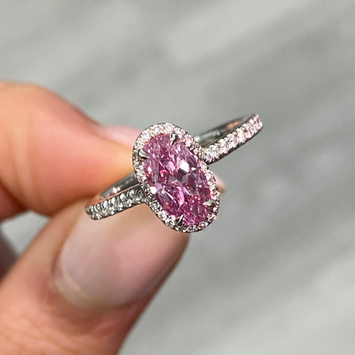 GIA certified vivid purple-pink oval diamond ring, a unique marvel of nature, VS2 clarity.