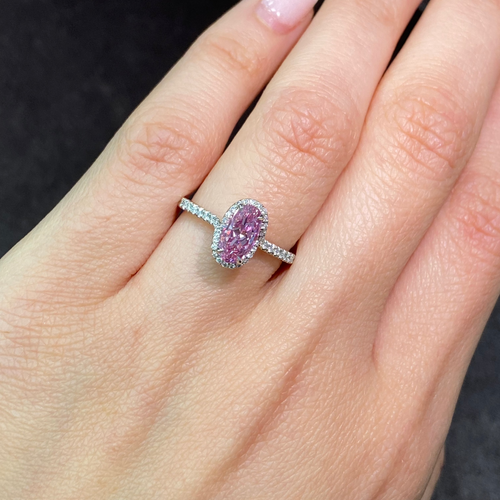 GIA certified vivid purple-pink oval diamond ring, a unique marvel of nature, VS2 clarity.