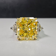 6.57 Carat Center Diamond GIA Fancy Intense Yellow Radiant Cut Diamond SI1 Clarity  Excellent, Good Cutting 0.71 Carat E VS1 Epaulettes Handmade in NYC Set in 18k & Platinum 