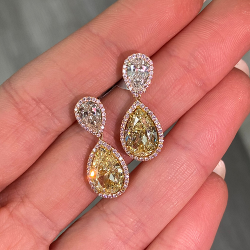 Fancy yellow diamond pear shape earrings.  yellow diamond drop earrings. diamond earrings.