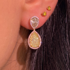 Fancy yellow diamond pear shape earrings.  yellow diamond drop earrings. diamond earrings.