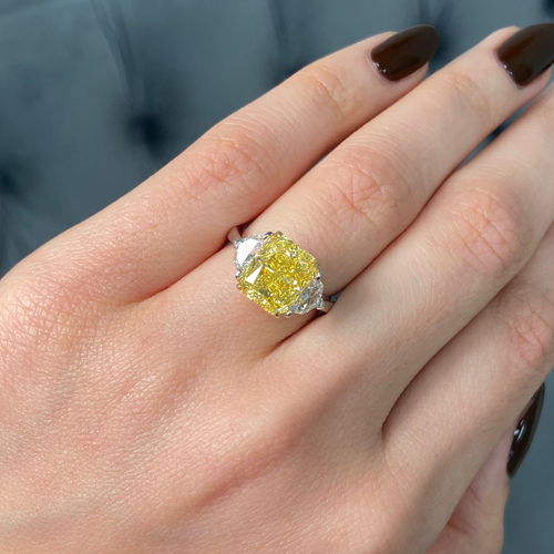 GIA certified fancy vivid yellow elongated radiant diamond engagement ring, internally flawless and stunning.