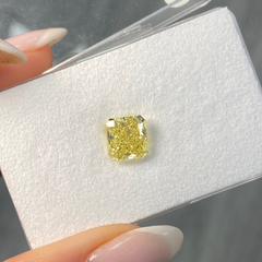 Fancy intense yellow radiant cut diamond with VS1 clarity, excellent cut, GIA certified.