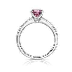 GIA certified Fancy Intense Pink round diamond engagement ring with pear shaped accents.