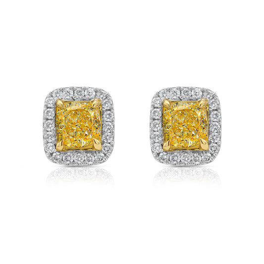 Fancy Light Yellow Cushion Diamond Studs 1.42 carat total center diamonds Center diamonds are 0.71ct each Surrounded by 0.22 Carats of White Radiant Diamonds Set in 18k Gold Handmade in NYC
