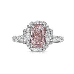 1.5 carat elongated radiant cut diamond ring. natural pink diamond ring, fancy light orangy pink diamond, halo diamond ring with pink diamond