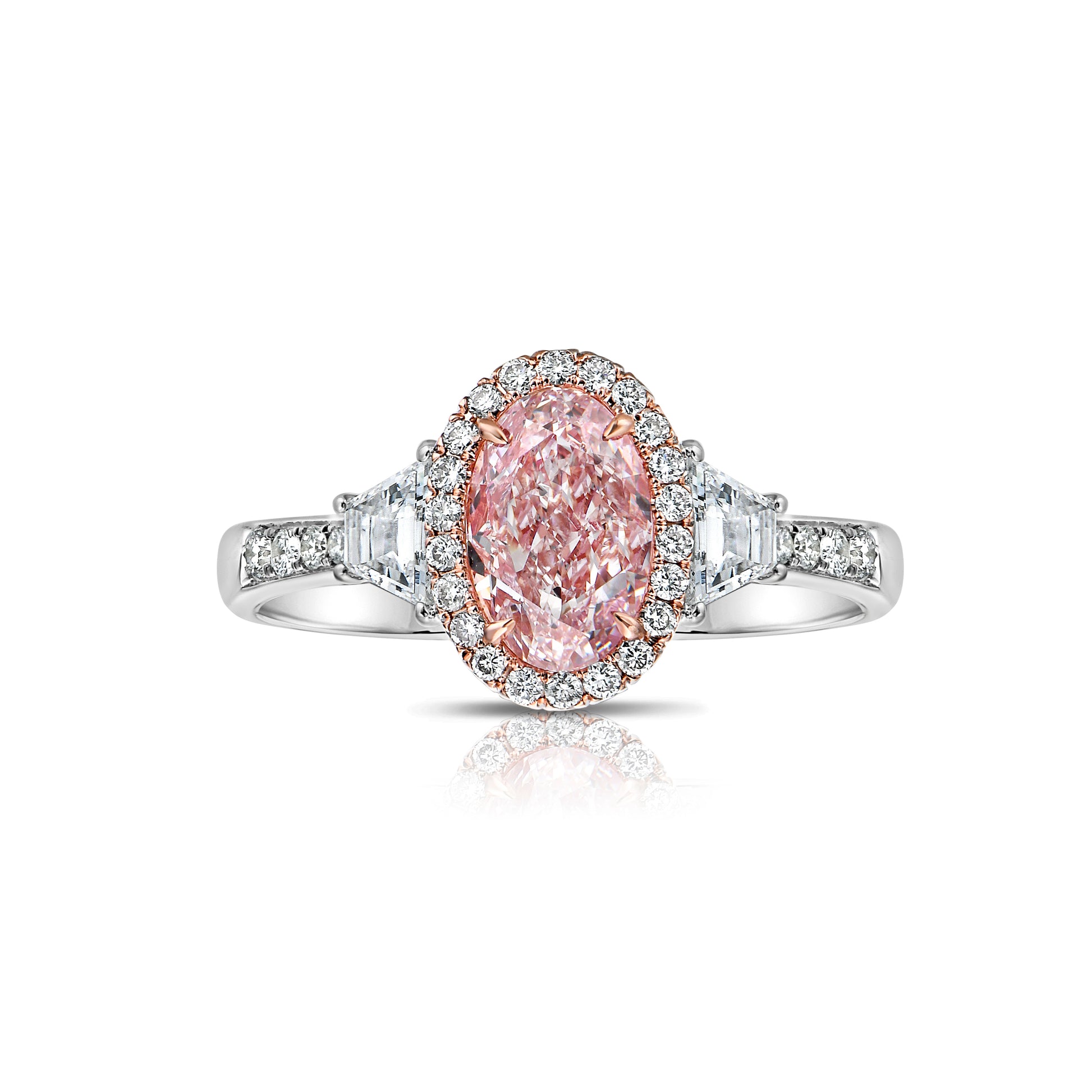 Pink diamond ring. pink diamond engagement ring. light pink diamonds. light pink oval diamond. Unique engagement ring.