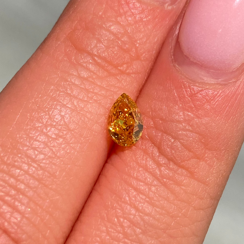 Yellow-Orange pear shape diamond 