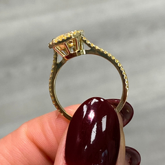 Elongated yellow diamond ring