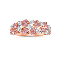 Fine pink and white diamond ring with mixed cuts, offering elegance and a unique design.