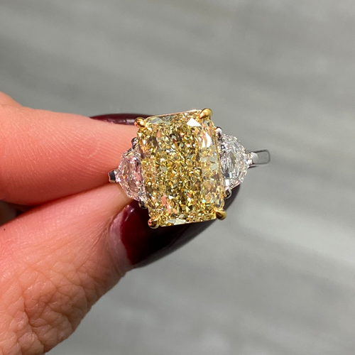 Radiant yellow diamond ring